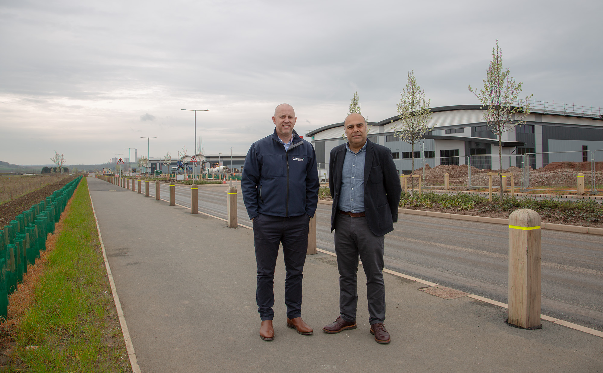 Fairham Business Park Two men stood on pavement outside an industrial unit