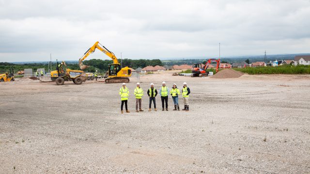 Clowes Developments Stud Brook Business Park six people in high vis on a construction site