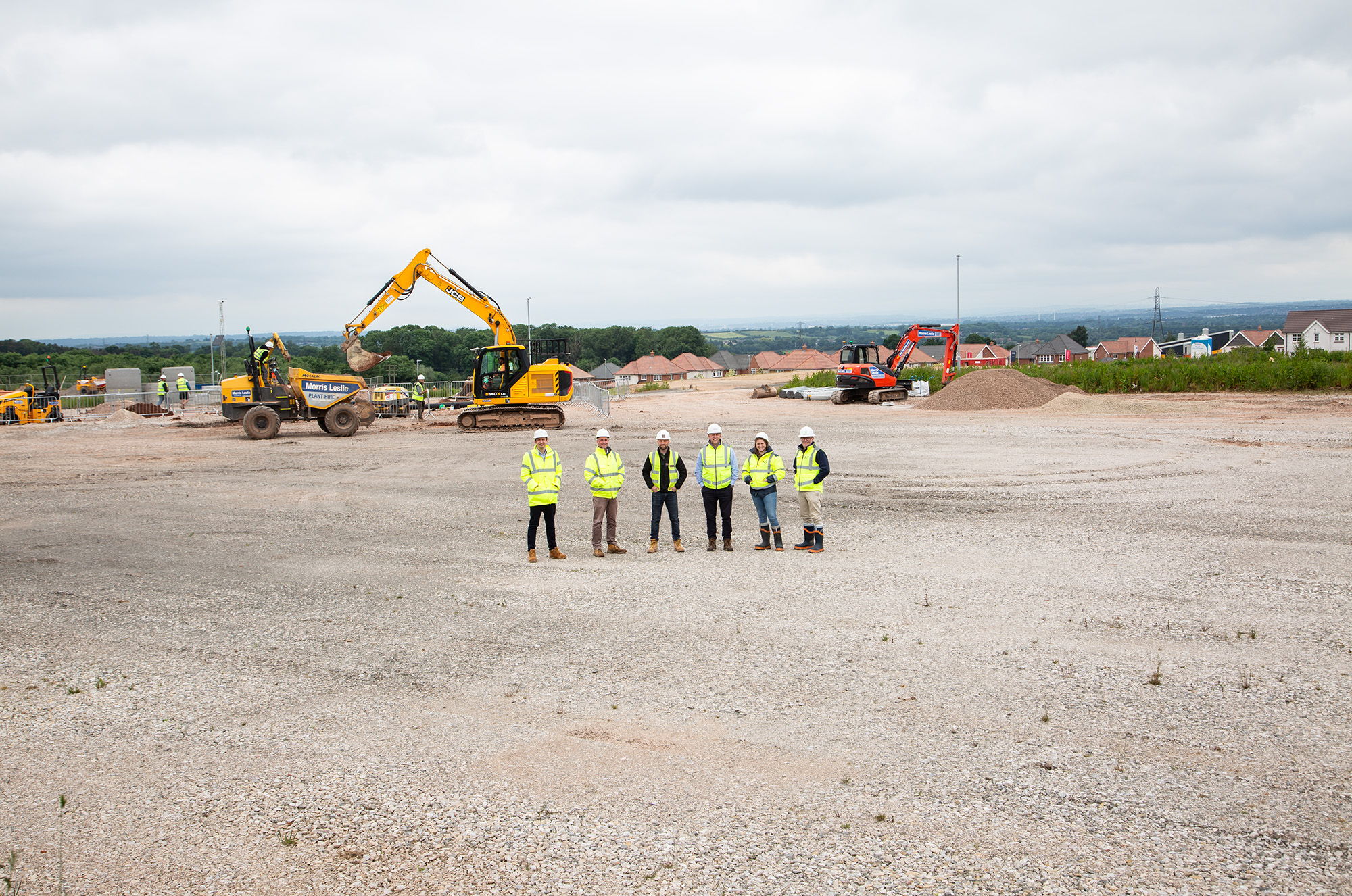 Clowes Developments Stud Brook Business Park six people in high vis on a construction site